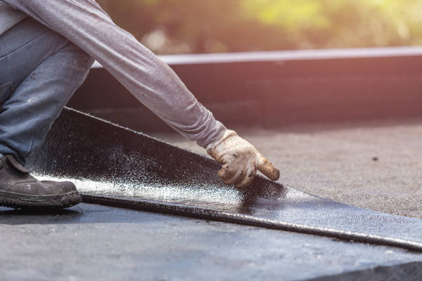 Professional Waterproofing technician working in Worthington, KY